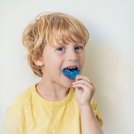 Signs Your Child Needs a Night Guard: Teeth Grinding and Clenching in Kids